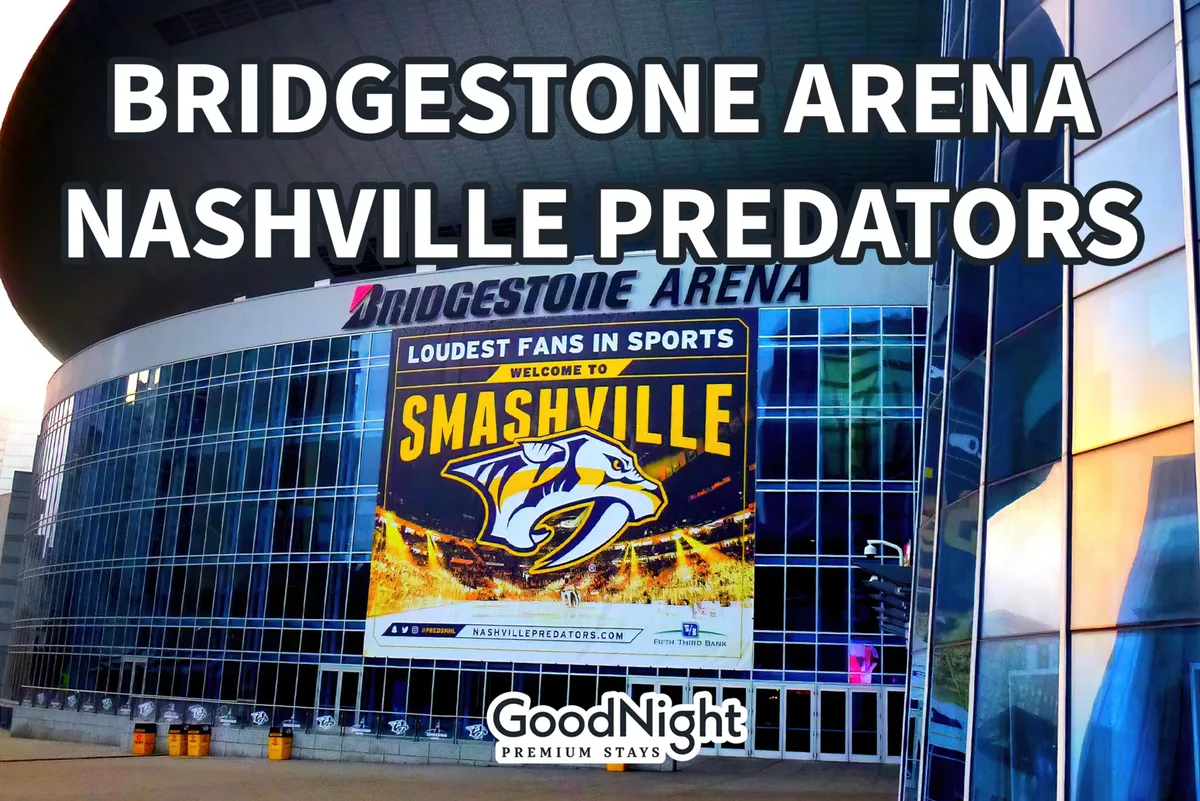 The exterior of Bridgestone Arena, prominently featuring the venue's sign, the Nashville Predators logo, and a welcoming 'Welcome to Smashville' banner. The area outside is bustling with anticipation and energy, hinting at the excitement of attending games and concerts at this major local landmark.